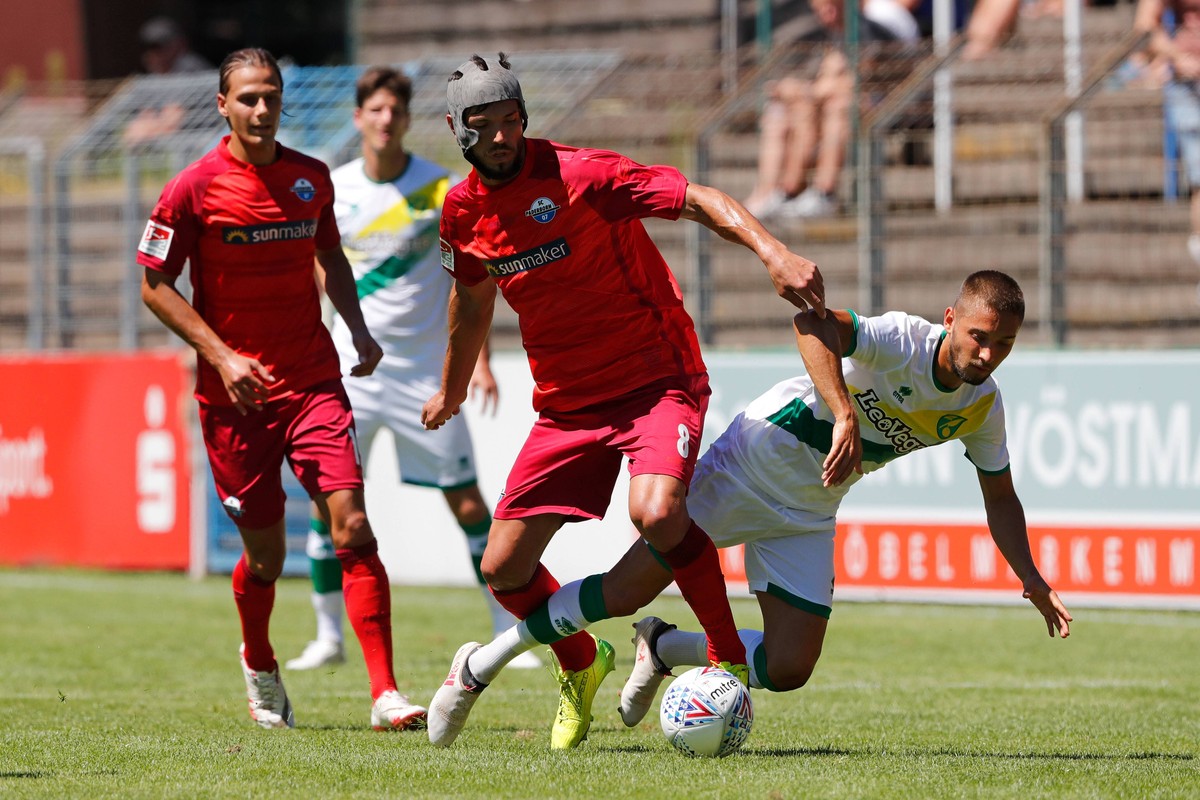 SC Paderborn v Norwich City Friendly (L-R) Klaus Gjasula of Paderborn, Moritz Leitner of Norwich City during the Friendly match at Benteler Arena, Paderborn PUBLICATIONxNOTxINxUK Copyright: xFocusxIma ...