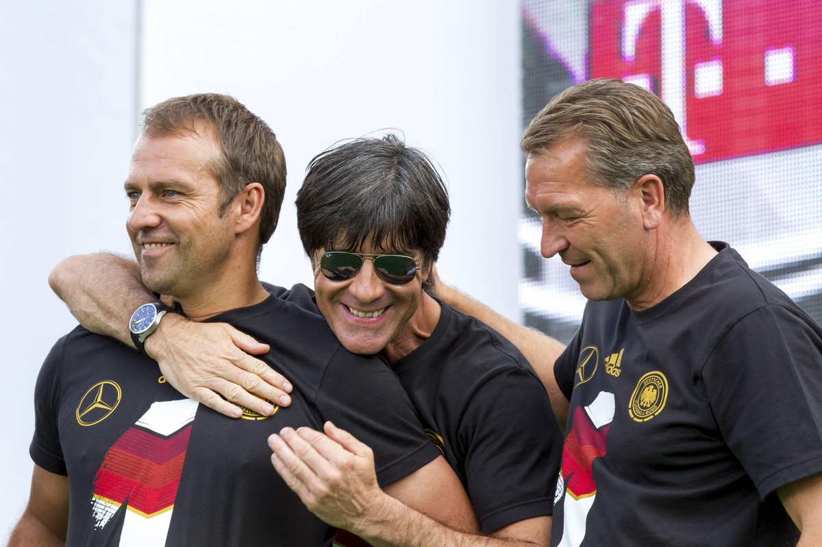 Hans-Dieter Hansi Flick, Joachim Jogi L�w und Andreas K�pke beim Empfang der Deutschen Nationalmannschaft auf der WM-Fanmeile auf der Stra�e des 17. Juni vor dem Brandenburger Tor. Berlin, 15.07.2014  ...