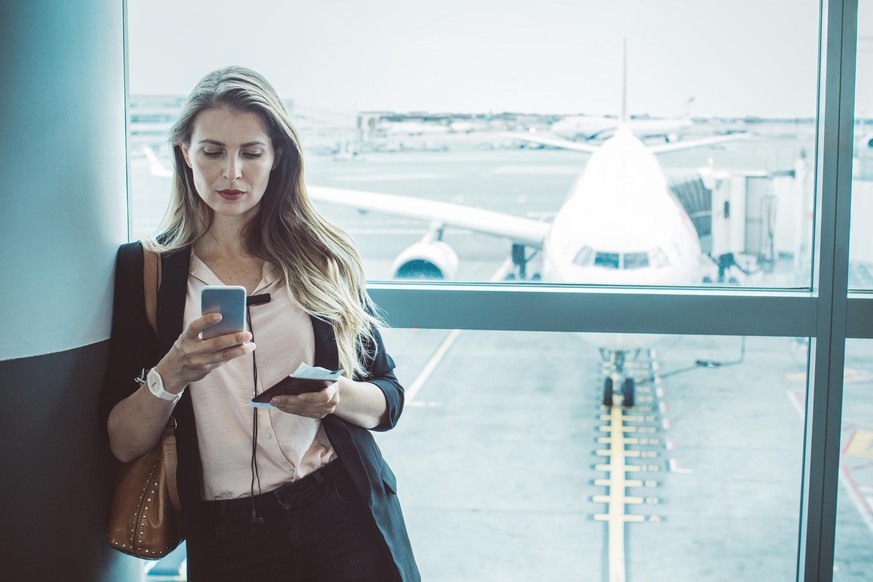 Woman at airport waiting area