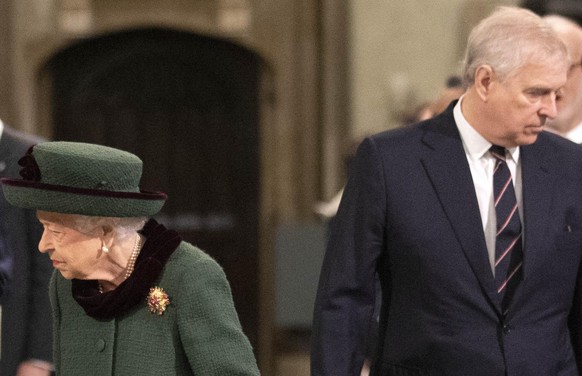 LONDON, ENGLAND - MARCH 29: (EDITORS NOTE: Retransmission with alternate crop.) Queen Elizabeth II arrives in Westminster Abbey accompanied by Prince Andrew, Duke of York for the Service of Thanksgivi ...