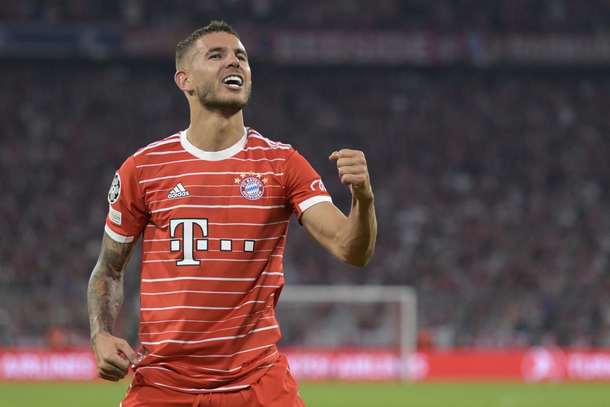 Bayern&#039;s Lucas Hernandez celebrates after scoring his side&#039;s opening goal during the Champions League, group C soccer match between Bayern Munich and Barcelona at the Allianz Arena in Munich ...