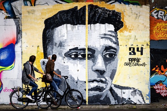 2017-07-17 09:45:52 A life size mural of Dutch Ajax player Abdelhak Nouri at a former shipyard in Amsterdam, the Netherlands, July 17. The mural is a tribute to the football player and was made by art ...