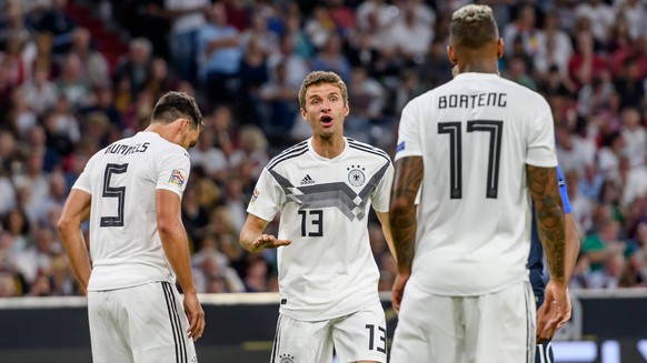 Muenchen, Deutschland 06.09.2018, UEFA Nations League, Deutschland - Frankreich, Mats Hummels (GER), Thomas Mueller (GER) und Jerome Boateng (GER) in der Diskussion ( DeFodi527 *** Muenchen Germany 06 ...