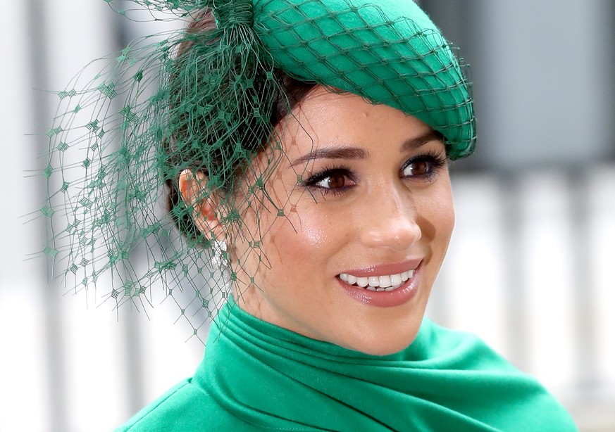 LONDON, ENGLAND - MARCH 09: Prince Harry, Duke of Sussex and Meghan, Duchess of Sussex meets children as she attends the Commonwealth Day Service 2020 on March 09, 2020 in London, England. (Photo by C ...