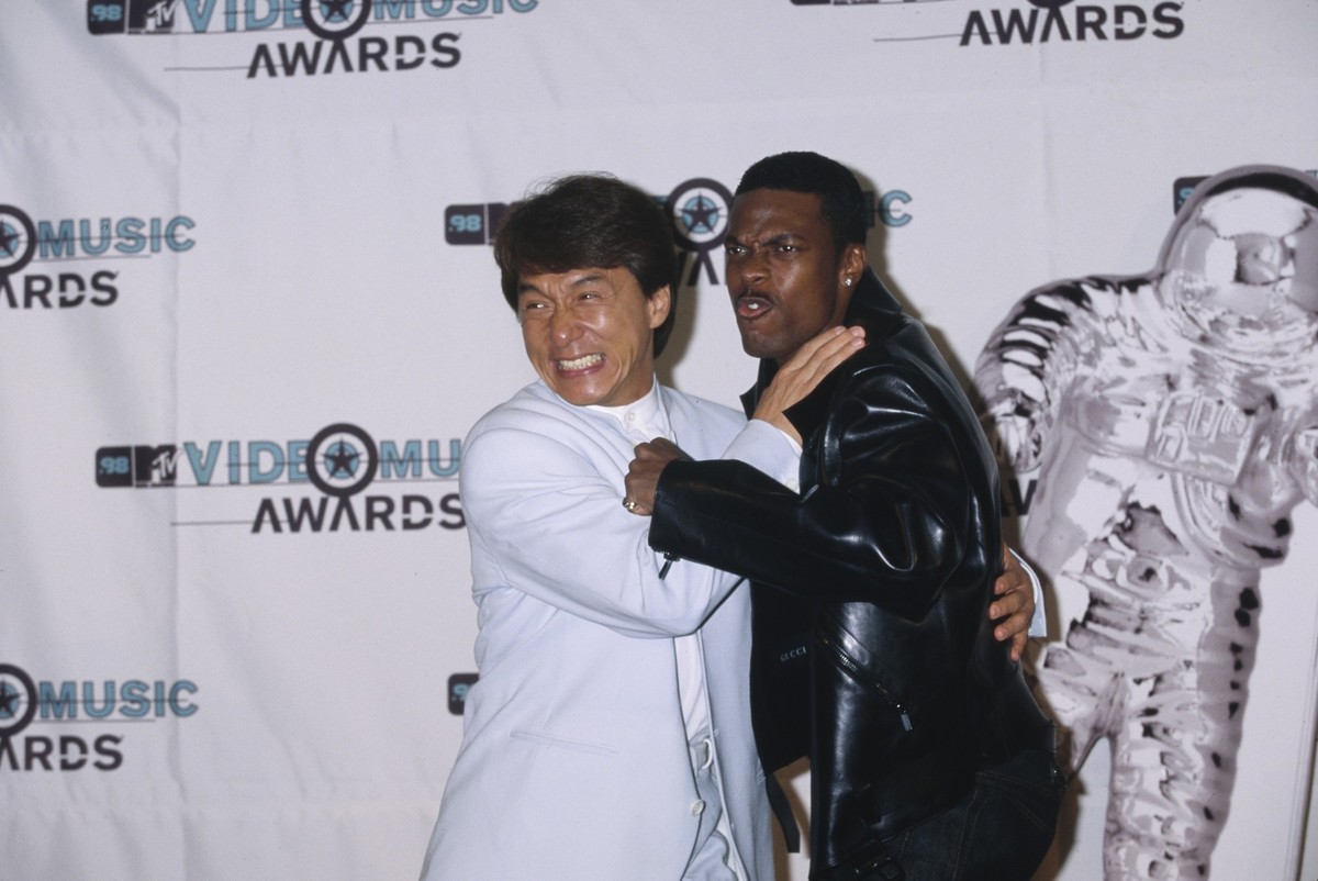 Hong Kong martial artist, actor and film director Jackie Chan, wearing a white suit, and American comedian and actor Chris Tucker, who wears a black leather jacket, in the MTV Video Music Awards press ...
