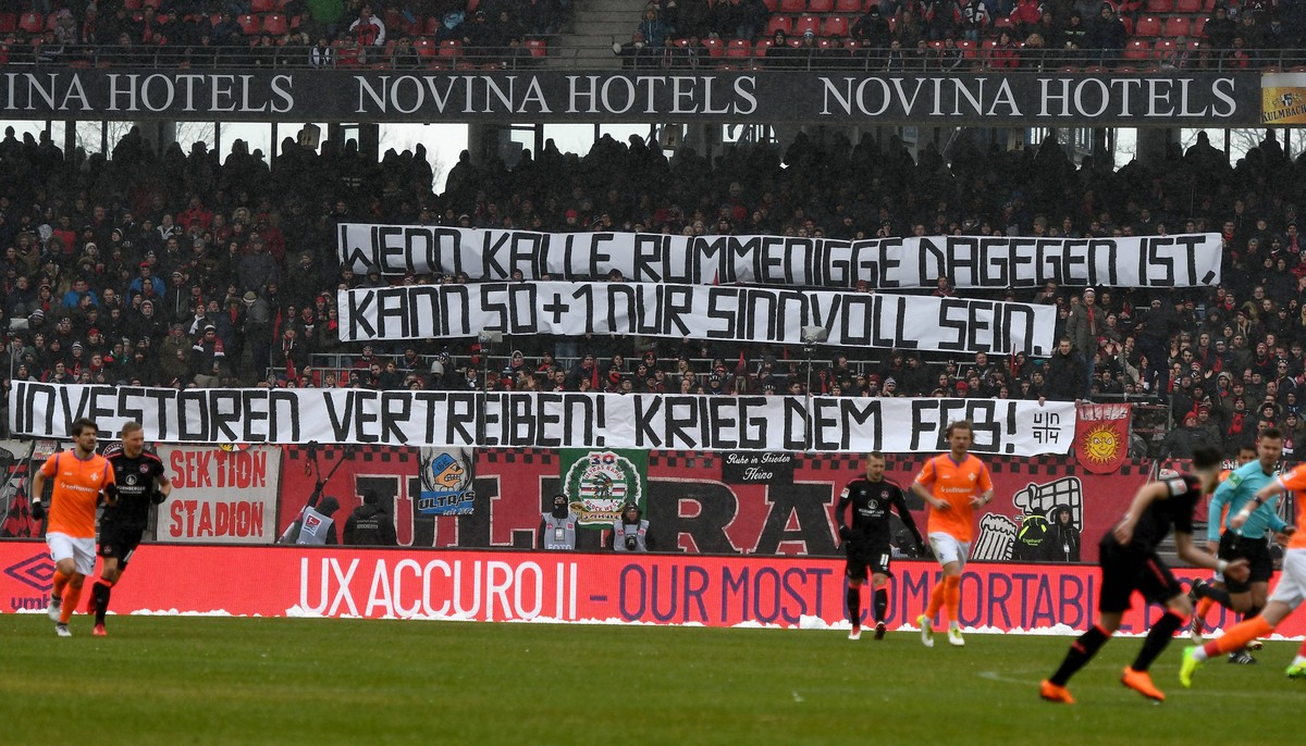 18.03.2018, xfux, Fussball 2.Bundesliga, 1.FC Nuernberg - SV Darmstadt 98, emspor, emonline, v.l. Fans 1.FC Nuernberg mit einem Banner gegen die 50+1 Regel Plakat Nuernberg *** 18 03 2018 xfux Footbal ...
