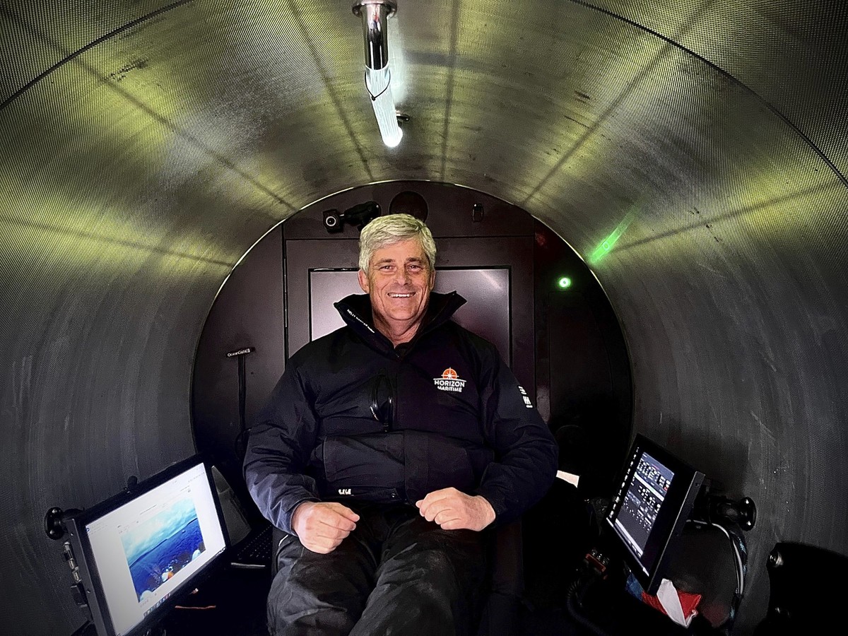 This photo provided by Travel Weekly shows OceanGate Expeditions CEO Stockton Rush on May 27, 2023. Rush was piloting the Titan submersible when it imploded near the wreckage of the Titanic, killing a ...