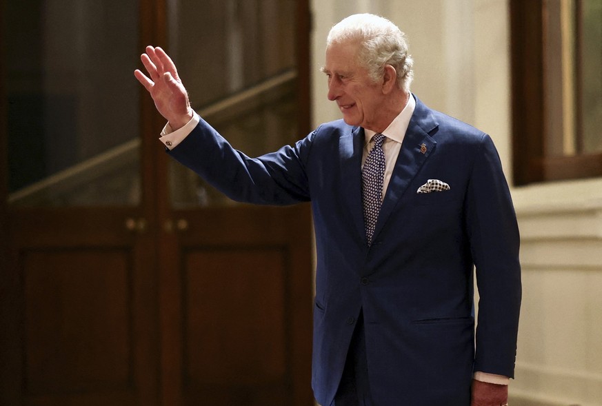 Britain&#039;s King Charles III gestures during a formal farewell with South African President Cyril Ramaphosa at the end of the state visit, at Buckingham Palace in London, Wednesday Nov. 23, 2022. ( ...