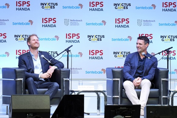 Britain&#039;s Prince Harry, left, and former All Blacks player Dan Carter attend an event organized by the International Sports Promotion Society (ISPS) Wednesday, Aug. 9, 2023, in Tokyo. The program ...