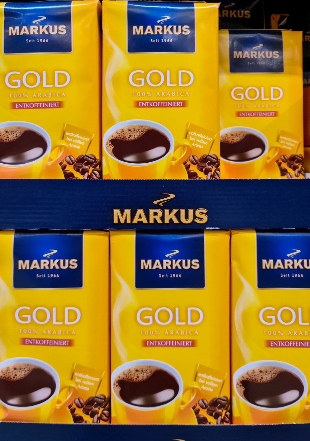 Kiel,Germany - 20 August 2022: Numerous packages of Markus brand coffee on a supermarket shelf., Kiel, Germany - 20 August 2022: Numerous packages of Markus brand coffee on a supermarket shelf, Kiel, ...