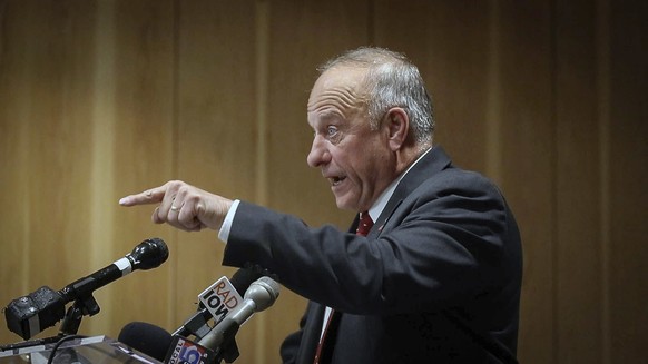 Iowa Congressman Steve King fires back at a man who asked a question about remarks King has made in the past during a candidate forum at the Greater Des Moines Partnership office in Des Moines, Iowa,  ...