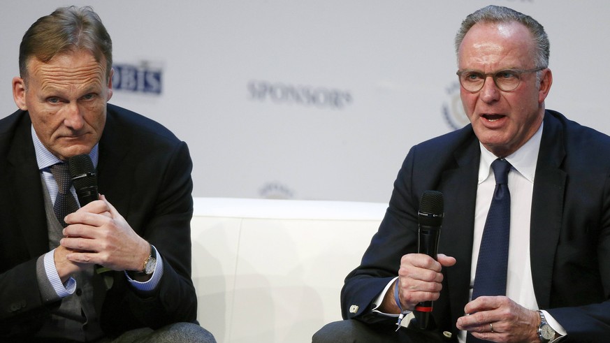 BVB-Geschäftsführer Hans-Joachim Watzke (l.) und Bayerns Vorstandsvorsitzender Karl-Heinz Rummenigge im Januar 2017 bei einem Kongress in Düsseldorf.