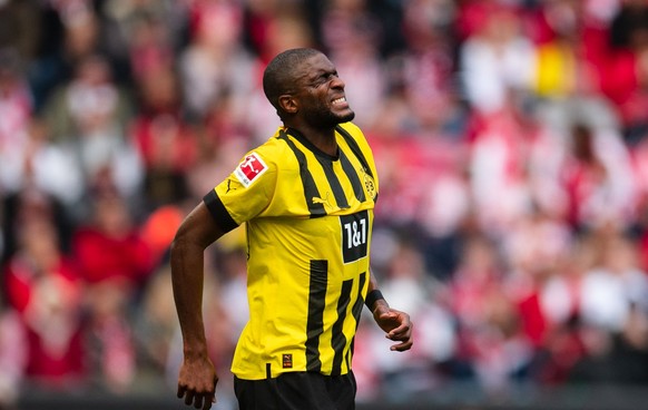 01.10.2022, Nordrhein-Westfalen, Köln: Fußball: Bundesliga, 1. FC Köln - Borussia Dortmund, 8. Spieltag, RheinEnergieStadion. Dortmunds Anthony Modeste verzieht das Gesicht. Foto: Marius Becker/dpa -  ...