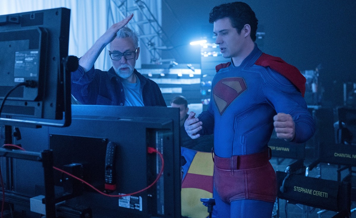This image released by Warner Bros. Pictures shows David Corenswet, right, and director James Gunn on the set of "Superman." (Jessica Miglio/Warner Bros. Pictures via AP)