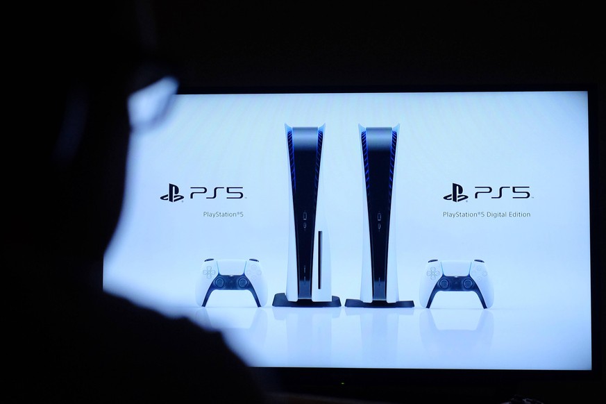 PlayStation 5 console reveal A man watches the PlayStation livestream reveal for the new PS5 console due to launch Autumn 2020. Photo credit should read: Katie Collins/EMPICS PUBLICATIONxINxGERxSUIxAU ...