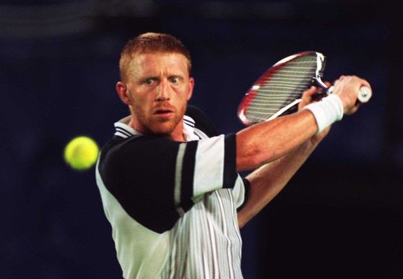 24 Jan 1996: Boris Becker of Germany in action against Yevgeny Kafelnikov of Russia at the Ford Australian Open at Flinders Park in Melbourne, Australia. Mandatory Credit: Phil Cole/Allsport