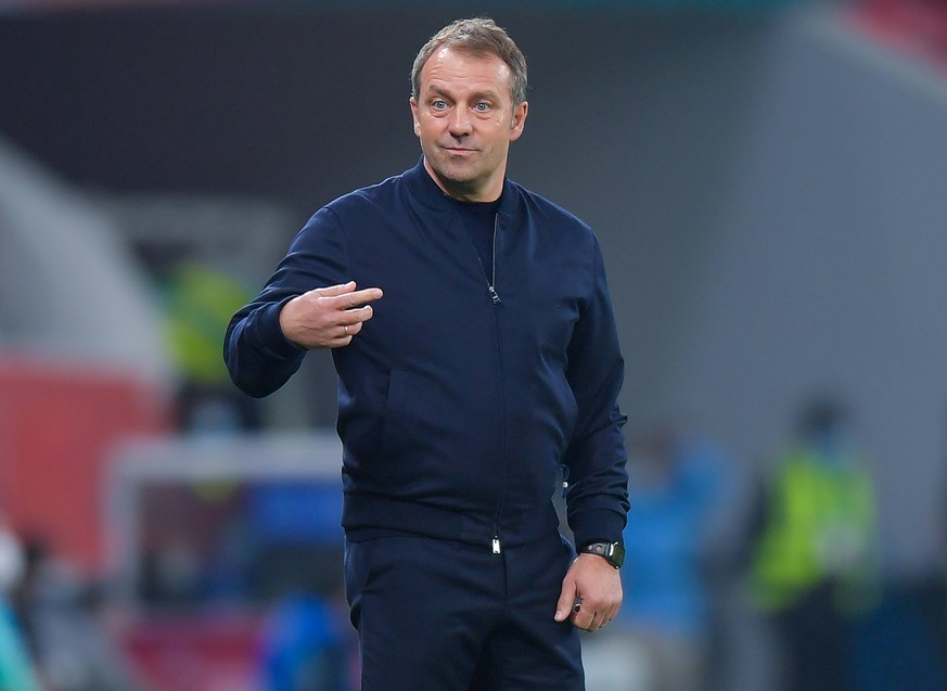 210209 -- DOHA, Feb. 9, 2021 -- Hansi Flick, head coach of Bayern Munich, guestures during the FIFA Club World Cup semi-final football match between Egypt s Al Ahly and Germany s Bayern Munich at Ahma ...