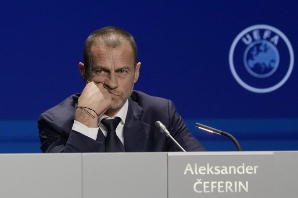 FILE - President of UEFA Aleksander Ceferin listens to questions during a news conference, after being reelected, at the end of the 47th ordinary UEFA congress in Lisbon, Wednesday, April 5, 2023. The ...