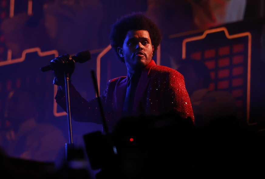 Canadian artist The Weeknd performs during half time at Super Bowl LV at Raymond James Stadium in Tampa, Florida on Sunday, February 7, 2021. Photo by John Angelillo/UPI Photo via Newscom picture alli ...