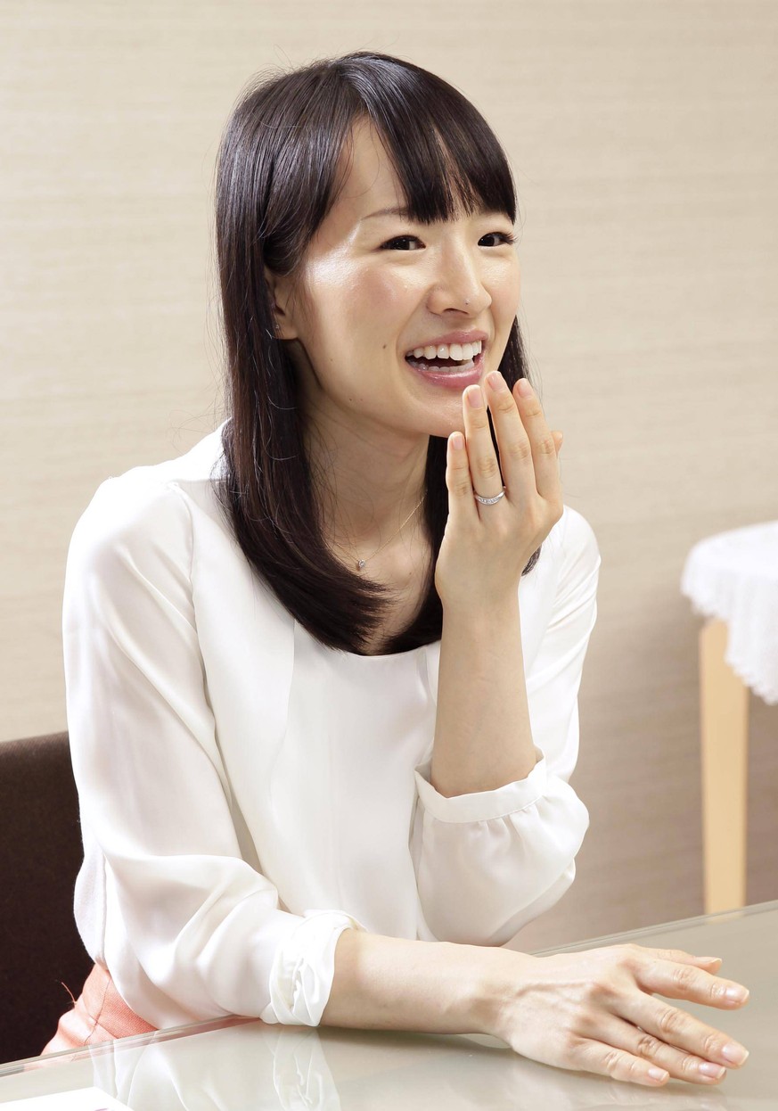 FEATURE: Tidy Queen mom faces ultimate decluttering challenge Japanese cleaning consultant Marie Kondo, better known as KonMari, a contraction of her full name, laughs during an interview with Kyodo N ...