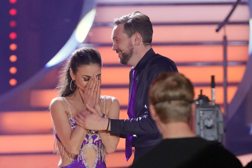 COLOGNE, GERMANY - APRIL 22: Bastian Bielendorfer and Ekaterina Leonova react during the 8th show of the 15th season of the television competition show &quot;Let&#039;s Dance&quot; at MMC Studios on A ...