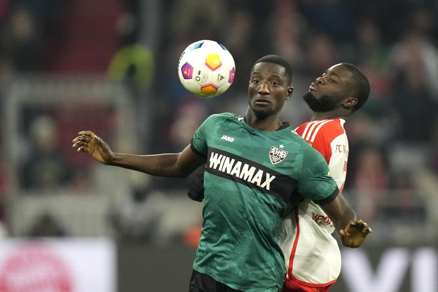 Stuttgart&#039;s Serhou Guirassy, left, heads the ball ahead of Bayern&#039;s Dayot Upamecano during the German Bundesliga soccer match between Bayern Munich and Stuttgart in Munich, Germany, Sunday,  ...