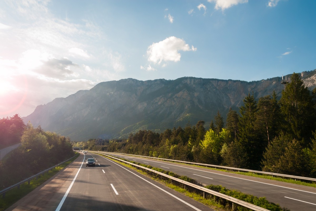 Autobahn in austrian mountains at sunset