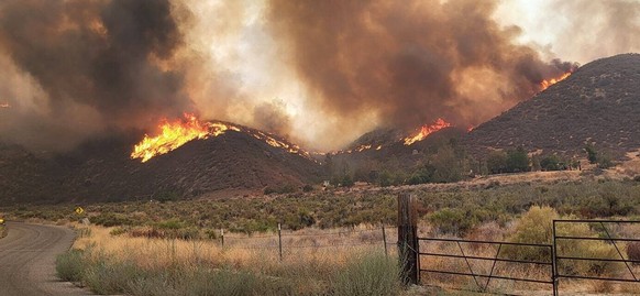 **VIDEO AVAILABLE: CONTACT INFOCOVERMG.COM TO RECEIVE** This video and images show firefighters from Californias Riverside fire department battling the Fairview fire on Tuesday 06September2022. They u ...