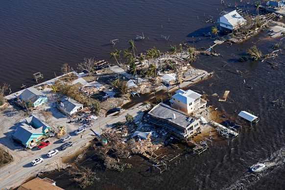 The bridge leading from Fort Myers to Pine Island, Fla., is seen heavily damaged in the aftermath of Hurricane Ian on Pine Island, Fla., Saturday, Oct. 1, 2022. Due to the damage, the island can only ...