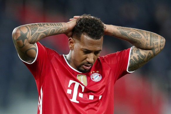 Bayern&#039;s Jerome Boateng reacts at the end of the Champions League, second leg, quarterfinal soccer match between Paris Saint Germain and Bayern Munich at the Parc des Princes stadium, in Paris, F ...