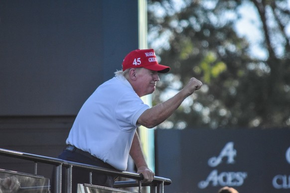 August 13, 2023, Bedminster, New Jersey, United States: President Donald J. Trump throws his fist in the air. Former President Donald J. Trump throws his fist in the air in a show of strength and defi ...