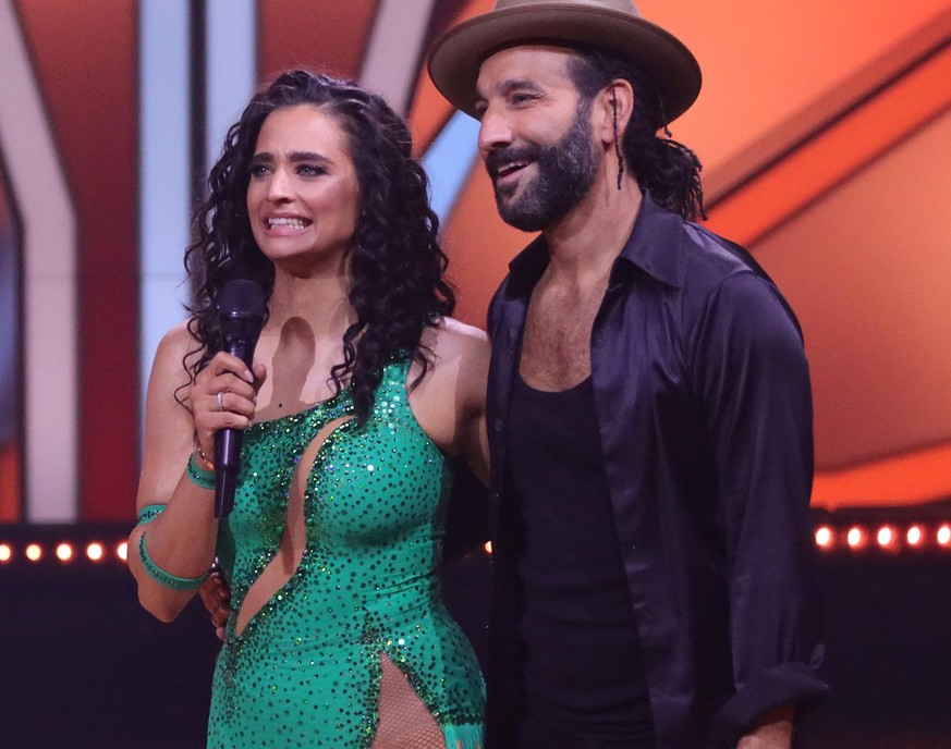 COLOGNE, GERMANY - FEBRUARY 25: Host Daniel Hartwich (L) with Amira Pocher and Massimo Sinato on stage during the 1st show of the 15th season of the television competition show &quot;Let&#039;s Dance& ...