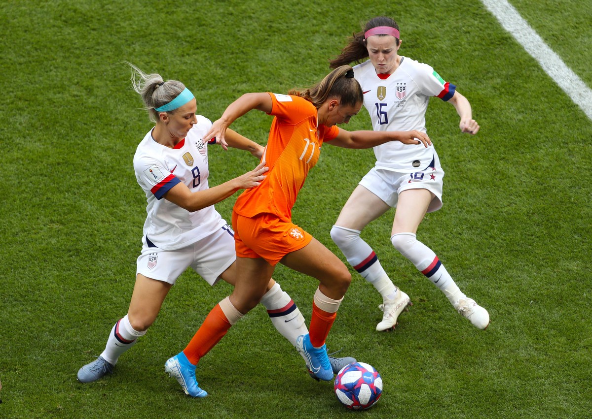 USA v Netherlands - FIFA Women s World Cup 2019 - Final - Stade de Lyon Netherlands Lieke Martens (centre) battles for the ball with USA s Julie Ertz (left) and USA s Rose Lavelle Editorial use only. ...