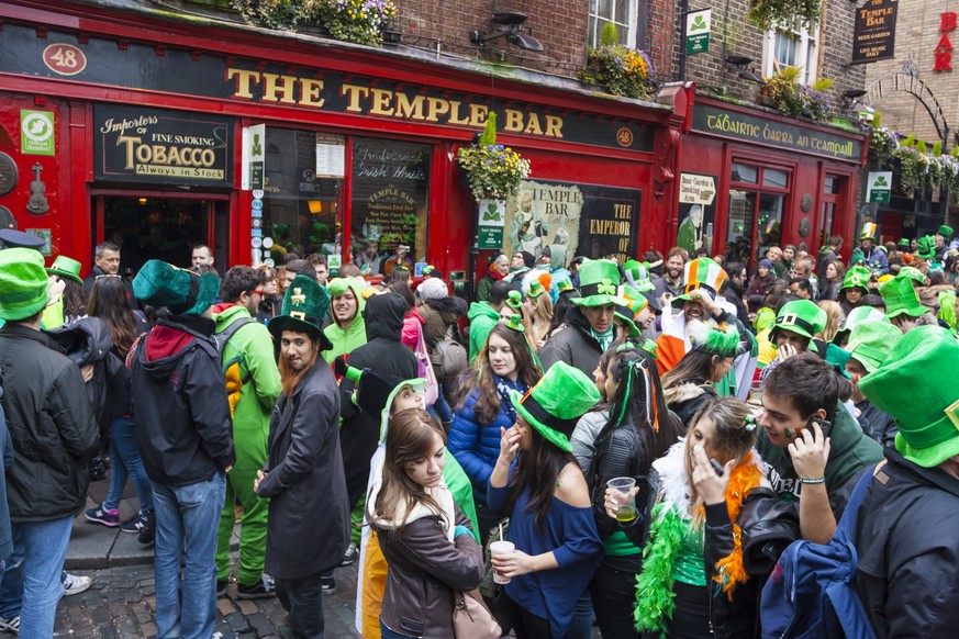 Dublin, Ireland - March 17, 2014: Saint Patrick's Day parade in Dublin Ireland on March 17, 2014: People dress up Saint Patrick's at The Temple Bar