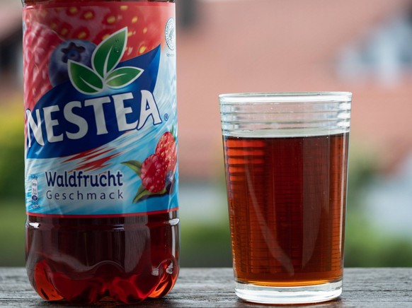 May 5, 2022, Vilshofen on the Danuba, Bavaria, Germany: A view of a glass and plastic bottle of Nestea Wild Berries Vilshofen on the Danuba Germany - ZUMAs197 20220505_zaa_s197_266 Copyright: xIgorxGo ...