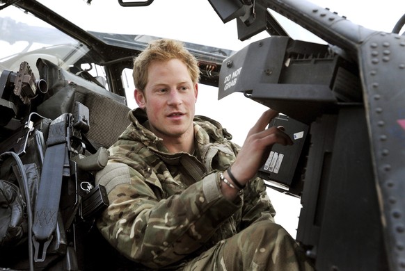 FILE- In this photo taken Dec. 12, 2012, made available Monday Jan. 21, 2013 of Britain&#039;s Prince Harry or just plain Captain Wales as he is known in the British Army, makes his early morning pre- ...