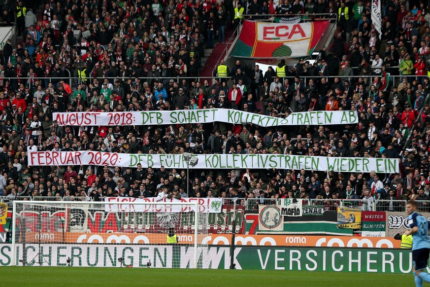 Fans FC Augsburg mit Banner, Botschaft, FC Augsburg vs. Borussia Moenchengladbach, Fussball, 1.Bundesliga, 29.02.2020, DFL REGULATIONS PROHIBIT ANY USE OF PHOTOGRAPHS AS IMAGE SEQUENCES AND/OR QUASI-V ...