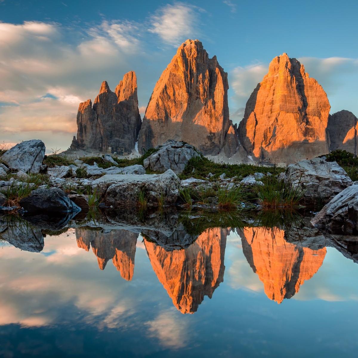 Drei Zinnen or Tre Cime di Lavaredo with reflection in lake at sundown, Dolomites, South Tirol, Italian Alps, Europe