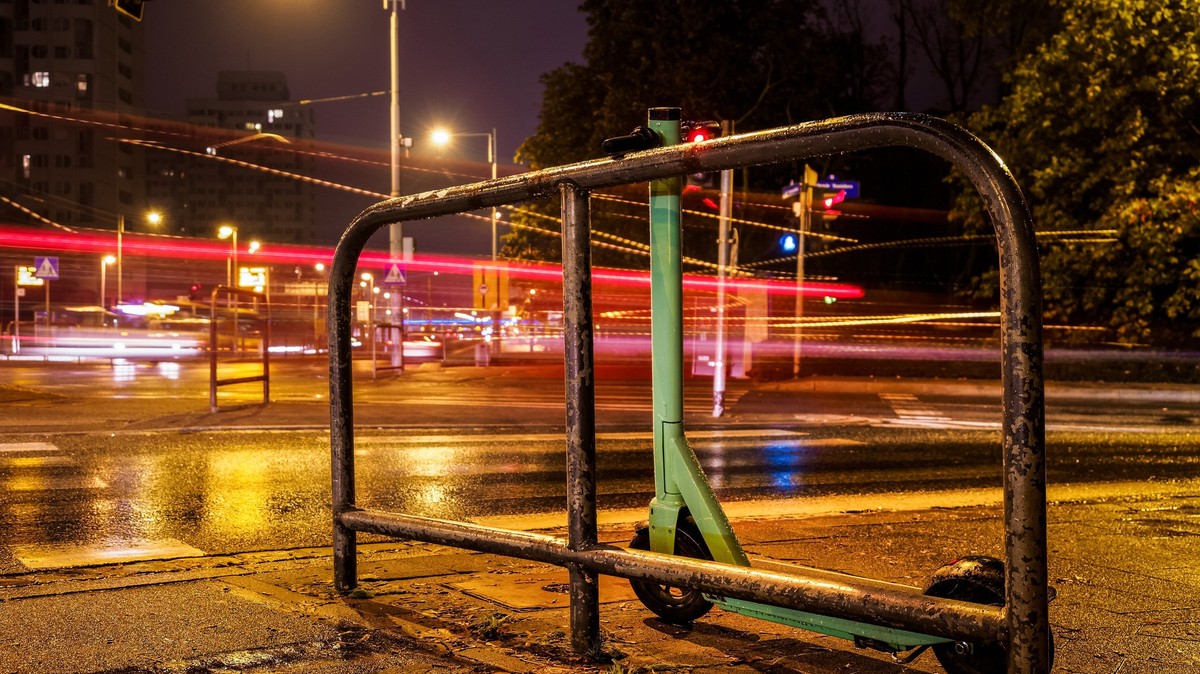 electric scooter on a rainy night city street