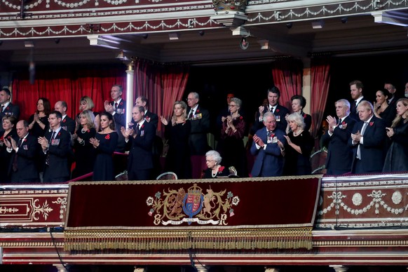 Royal British Legion Festival of Remembrance 2019. Queen Elizabeth II (centre) with members of the royal family attend the annual Royal British Legion Festival of Remembrance at the Royal Albert Hall  ...