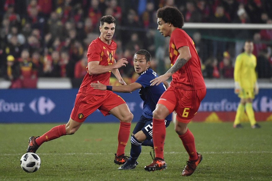 Belgium s Thomas Meunier, Japan s midfielder Yosuke Ideguchi and Belgium s Axel Witsel pictured in action during a friendly soccer game between Belgian national team Nationalteam Red Devils and Japan, ...