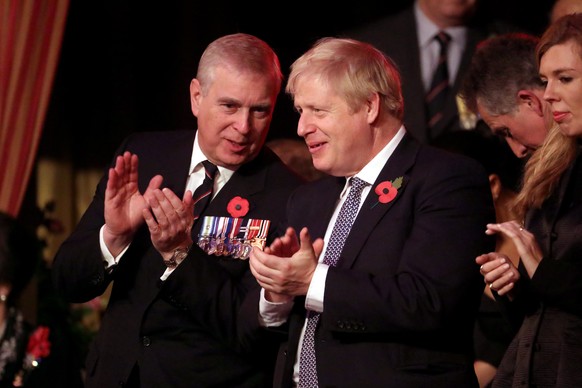 LONDON, ENGLAND - NOVEMBER 09: Prince Andrew, Duke of York and Prime Minister, Boris Johnson attend the annual Royal British Legion Festival of Remembrance at the Royal Albert Hall on November 09, 201 ...