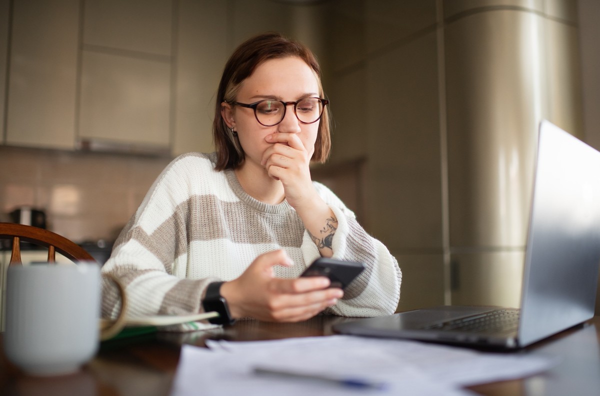 Woman reviewing financial documents