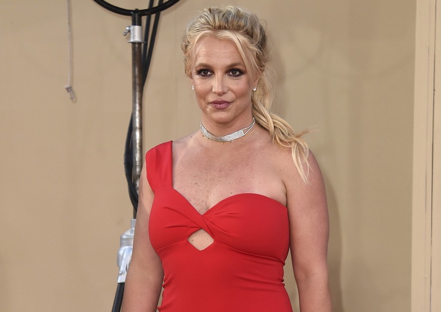 FILE - Britney Spears arrives at the Los Angeles premiere of &quot;Once Upon a Time in Hollywood,&quot; on July 22, 2019. A man once briefly married to Britney Spears was convicted Friday, Aug. 12, 20 ...