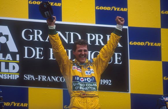 1992 Belgian Grand Prix. Spa-Francorchamps, Belgium. 28-30 August 1992. Michael Schumacher Benetton Ford celebrates 1st position and his maiden Grand Prix win on the podium. Ref-92 BEL 07. World Copyr ...