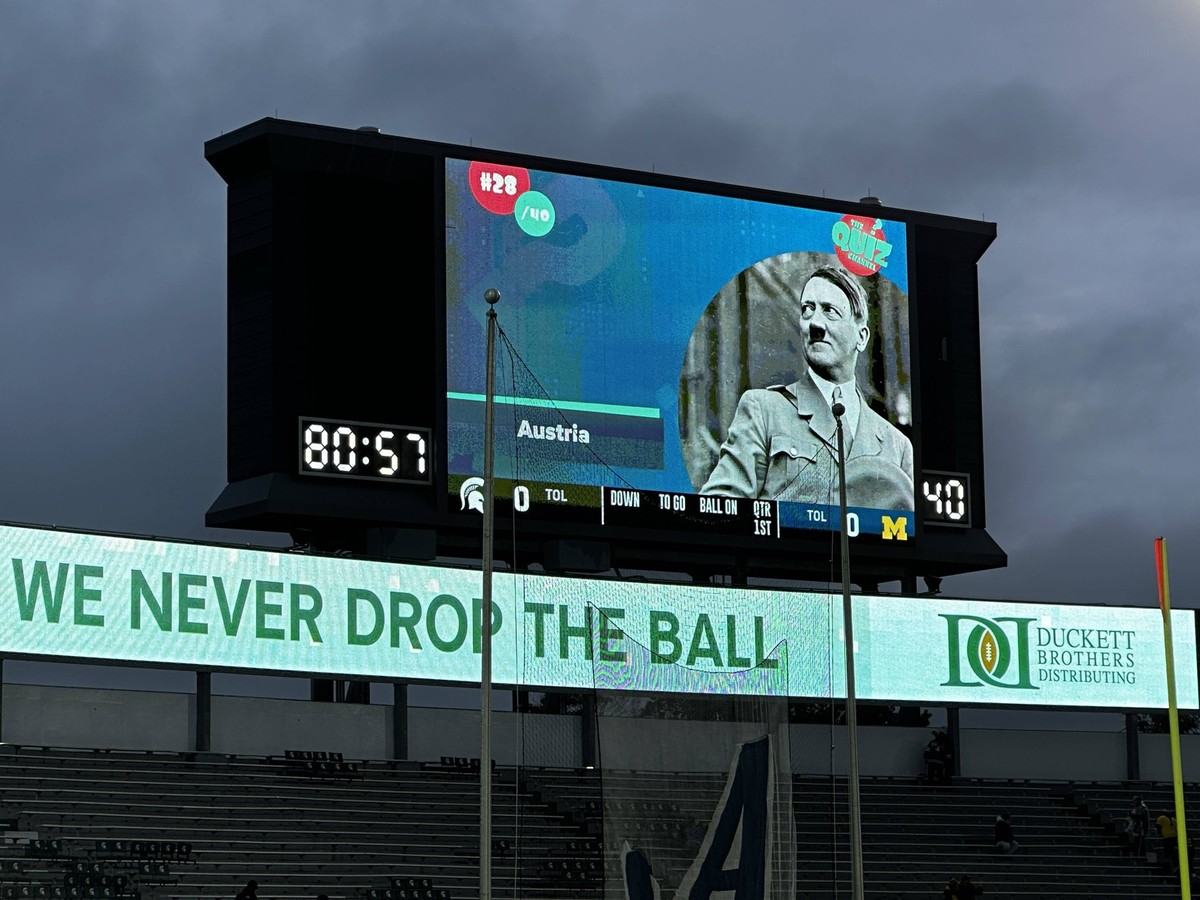 October 21, 2023, East Lansing, Michigan, U.S: ADOLF HITLER is displayed on the scoreboard at Michigan State University as part of a pregame trivia feature before Michigan State played the University ...