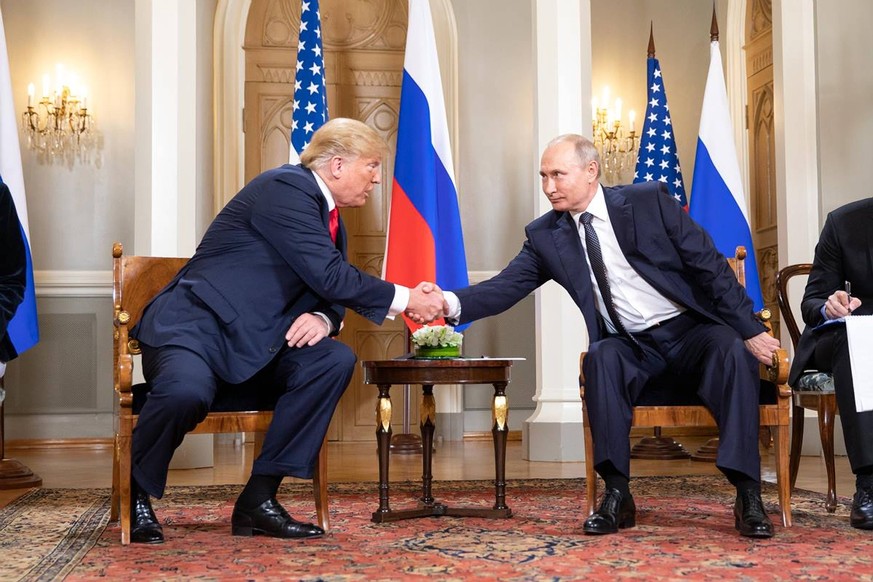 July 16, 2018 - Helsinki, Finland - Russian President Vladimir Putin shakes hands with U.S. President Donald Trump during the U.S. - Russia Summit meeting at the Presidential Palace July 16, 2018 in H ...