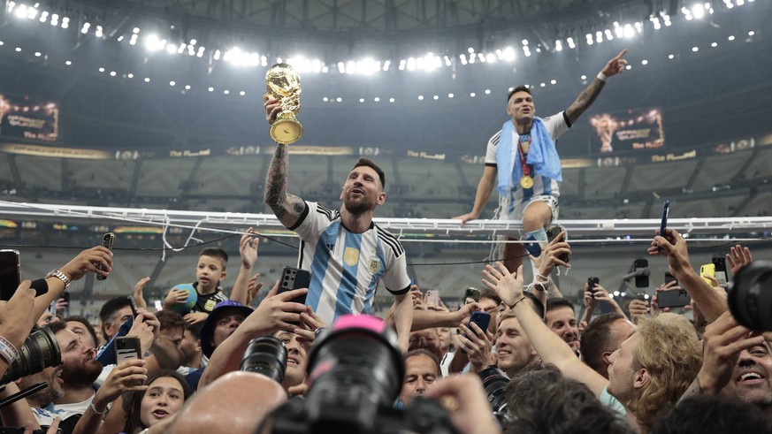Lionel Messi of Argentina celebrates today, after winning the Qatar 2022 World Cup final between Argentina and France at the Lusail stadium, Qatar, 18 December 2022. Soccer World Cup 2022: Argentina - ...
