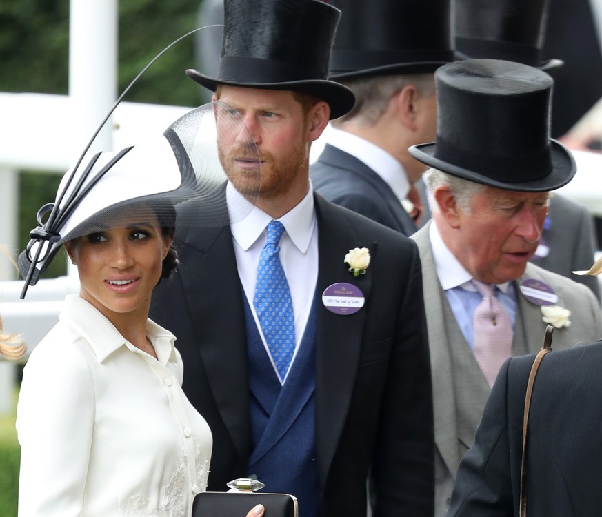 ASCOT, ENGLAND - JUNE 19: Meghan, Duchess of Sussex, Prince Harry, Duke of Sussex and Prince Charles, Prince of Wales attend Royal Ascot Day 1 at Ascot Racecourse on June 19, 2018 in Ascot, United Kin ...