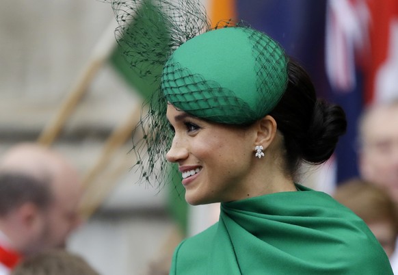 FILE - In this Monday, March 9, 2020 file photo, Britain&#039;s Meghan, the Duchess of Sussex leaves after attending the annual Commonwealth Day service at Westminster Abbey in London. Prince Harry, t ...